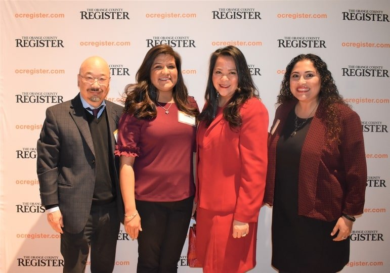 Front left to right: Board Chairman Richard Lee, Clinic Operations Manager Darline Torres, Chief Executive Officer Ria Berger, Billings Supervisor Karina Flores